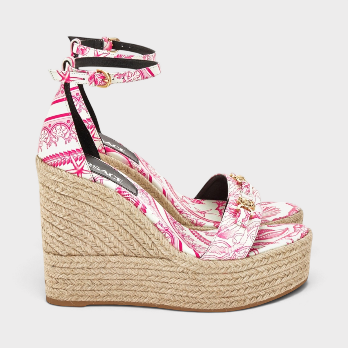 Supplied Fashion pink and white patterned platform espadrille wedges with gold Medusa hardware and ankle strap.
