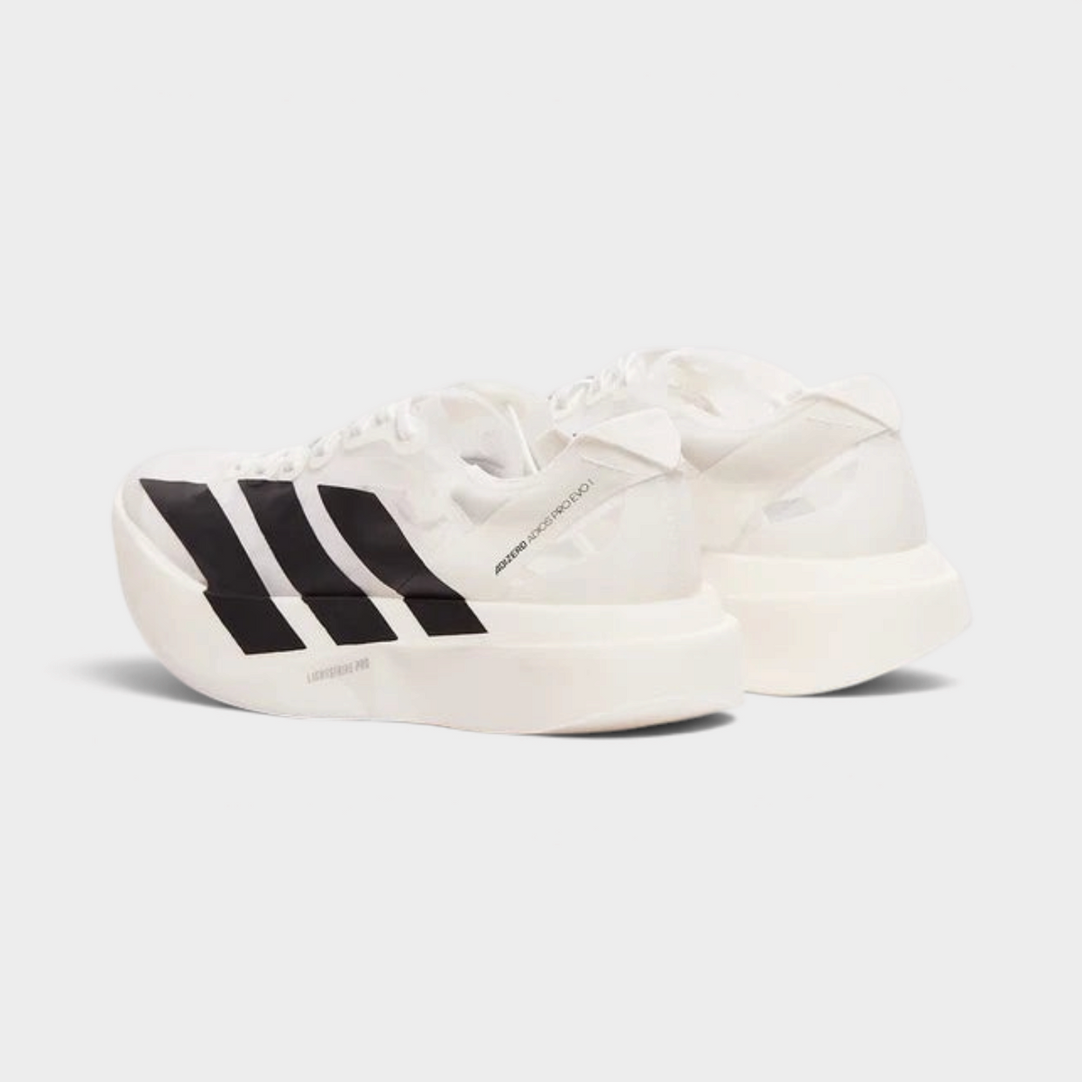 Supplied Fashion adidas Adizero Adios Pro Evo running shoe in crystal white and black with a lightweight mesh upper
