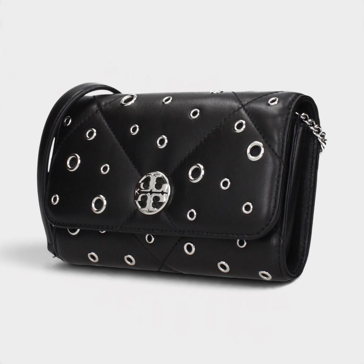 Supplied Fashion Willa black quilted leather chain wallet with silver grommets and logo hardware.