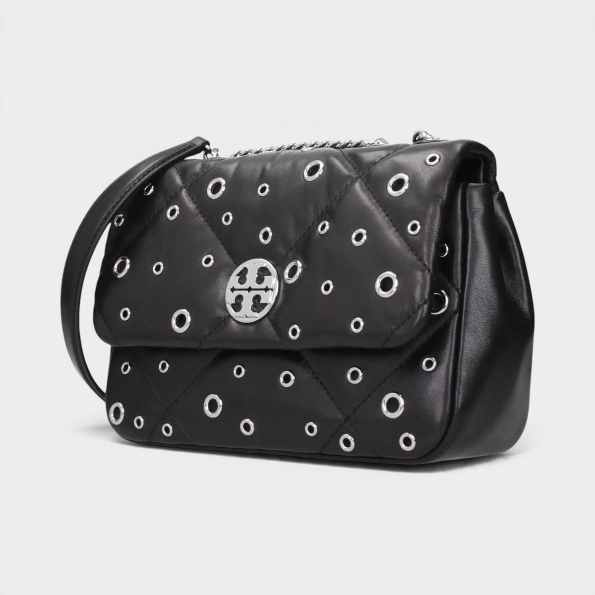 Supplied Fashion Tory Burch Willa black quilted leather shoulder bag with silver grommet details and logo hardware.