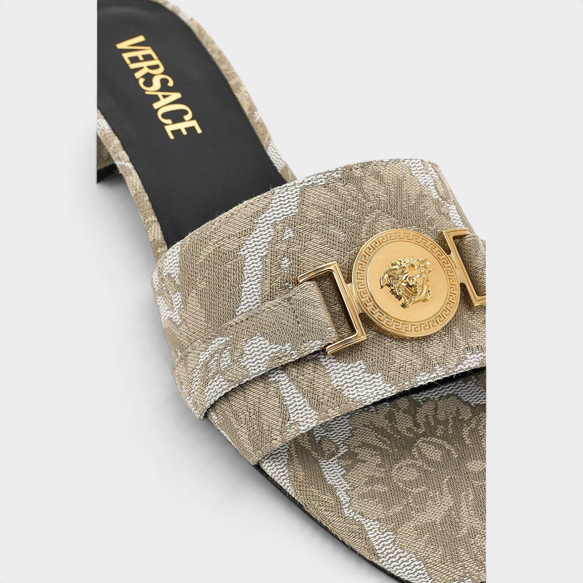 Supplied Fashion beige fabric sandal featuring a gold Medusa head icon and Versace logo on the black insole
