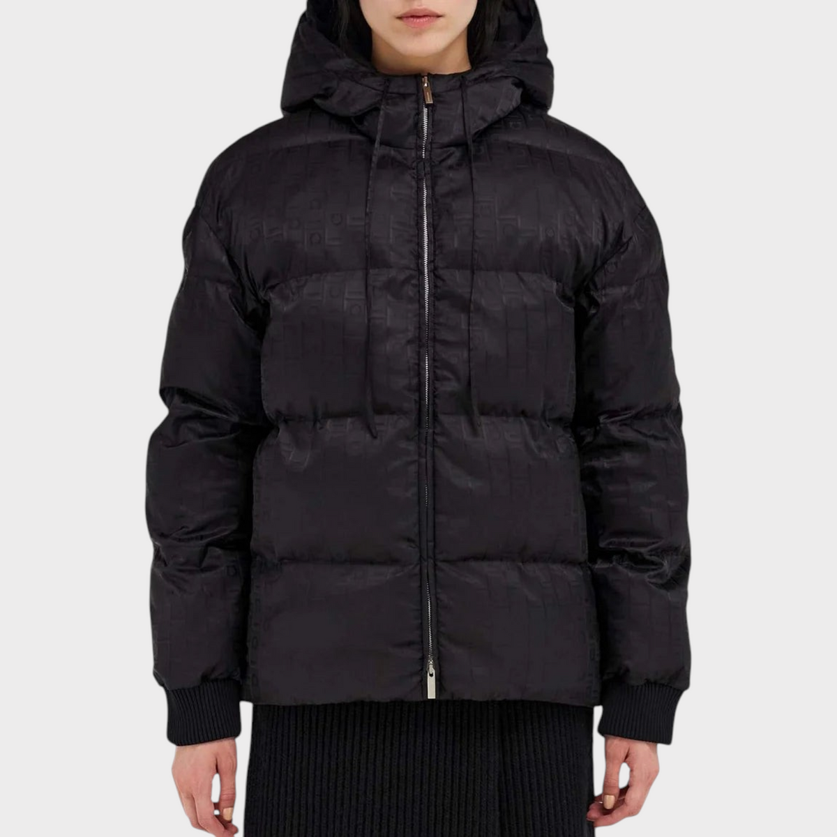 Supplied Fashion black monogram jacquard padded jacket with a hood and zip front closure on a model