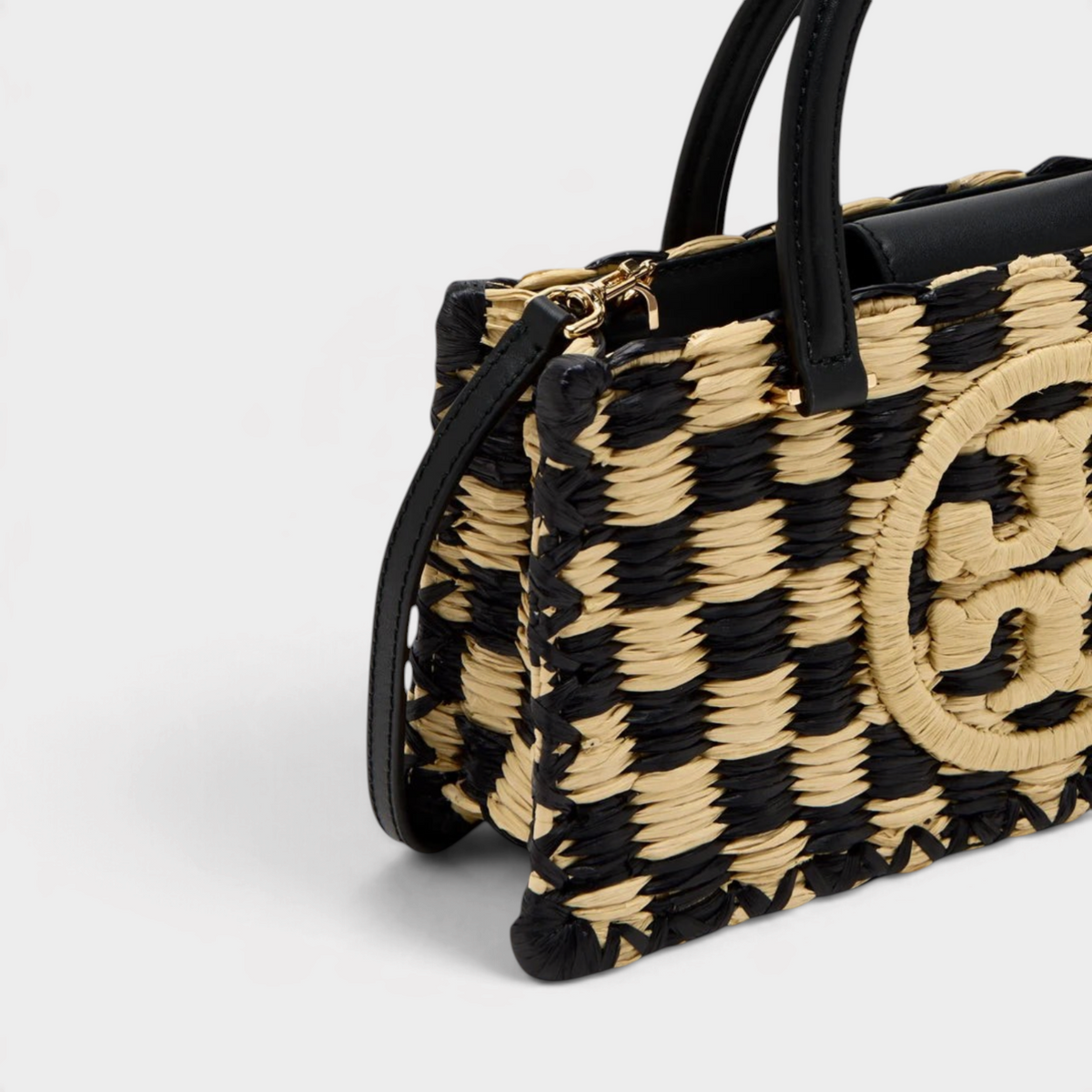 Supplied Fashion Ella hand-crocheted checkered handbag in black and natural straw with black leather handles