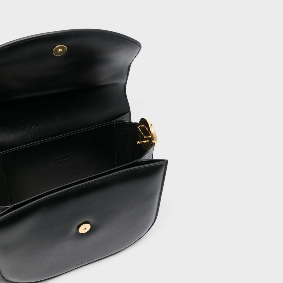 Supplied Fashion Medium Coin black leather crossbody bag with gold hardware, shown open to reveal interior detail.