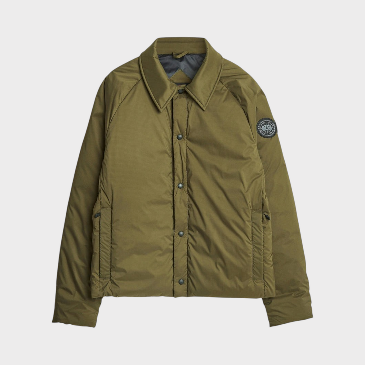 Supplied Fashion Lodge Coach Jacket in military green with a classic collar, snap button closure, and sleeve patch.