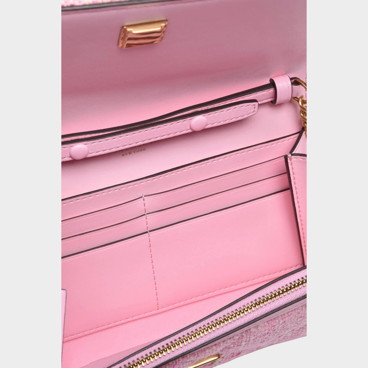 Interior of Supplied Fashion Tory Burch Willa pink tweed chain wallet showing card slots and zipper compartment