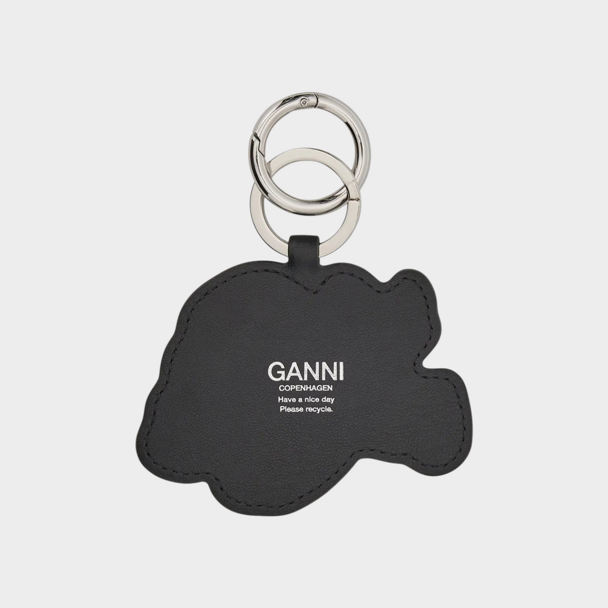 Supplied Fashion Ganni puppy keyring in black recycled leather with silver-tone clasp and white logo branding