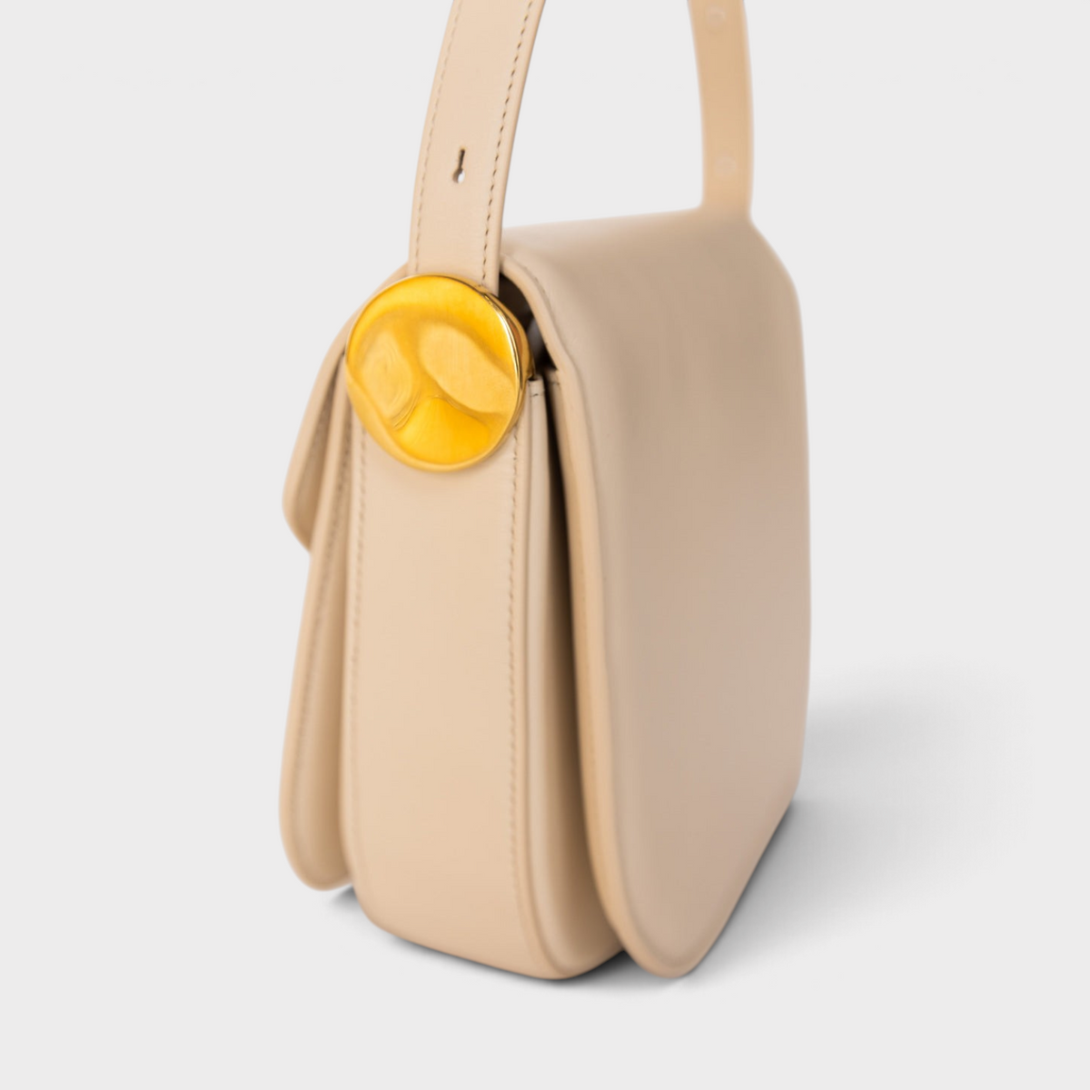 Supplied Fashion Jil Sander medium coin crossbody bag in dune beige Italian leather with gold hardware side view