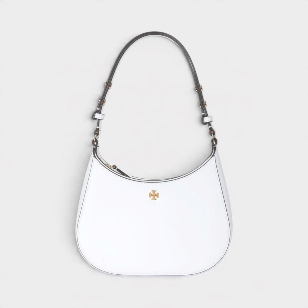 Supplied Fashion Emerson soft shoulder bag in optic white with gold logo hardware and adjustable strap.