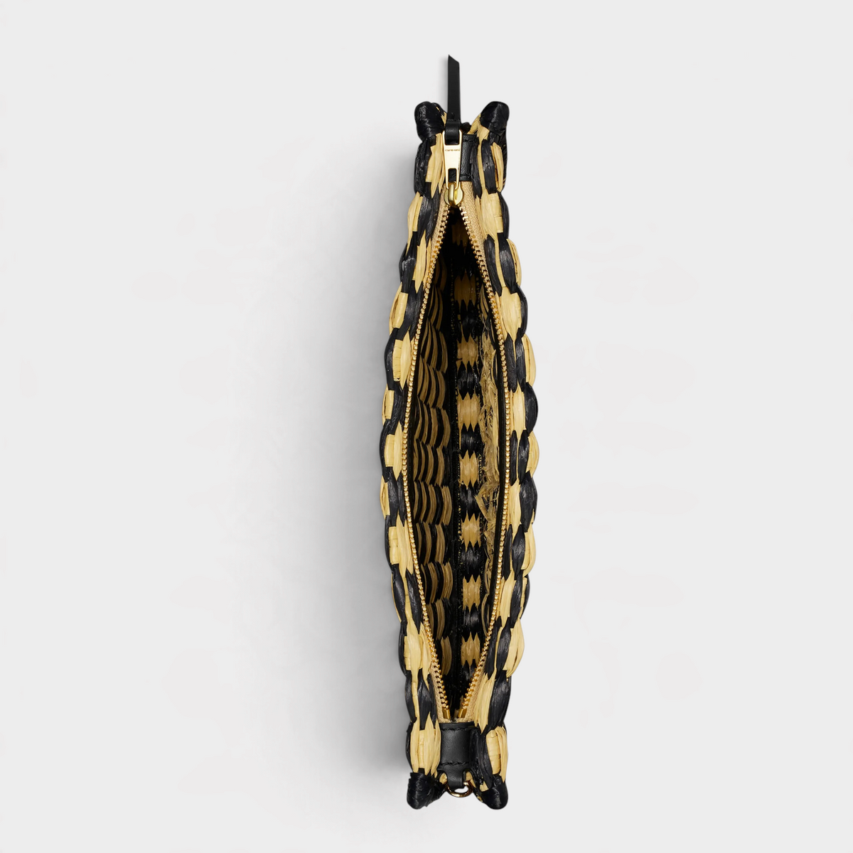 Supplied Fashion Ella crochet raffia pouch in black and natural beige with a gold zipper, top-down interior view.
