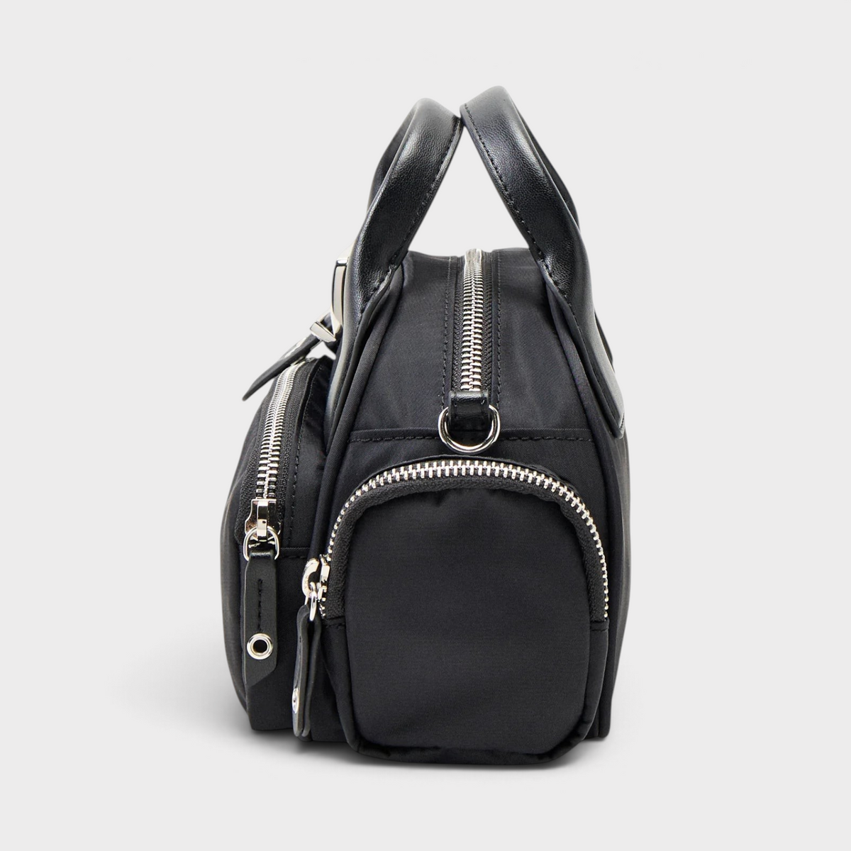 Supplied Fashion Bucky Polochon small black satchel with top handles, side zipper pockets, and silver hardware.