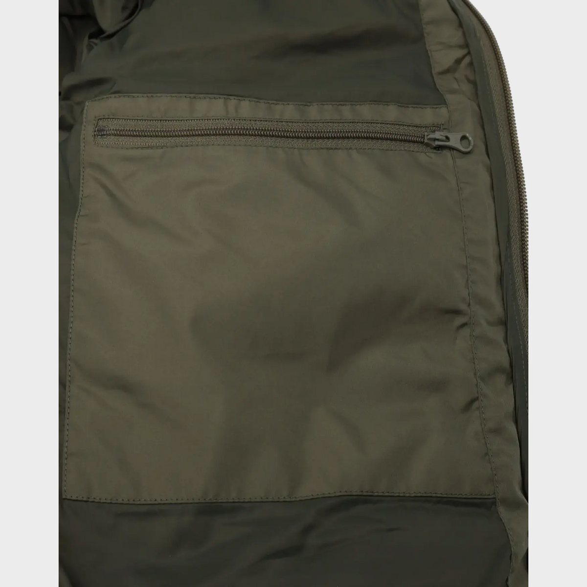 Supplied Fashion green down puffer jacket interior featuring a secure zippered pocket for essentials.