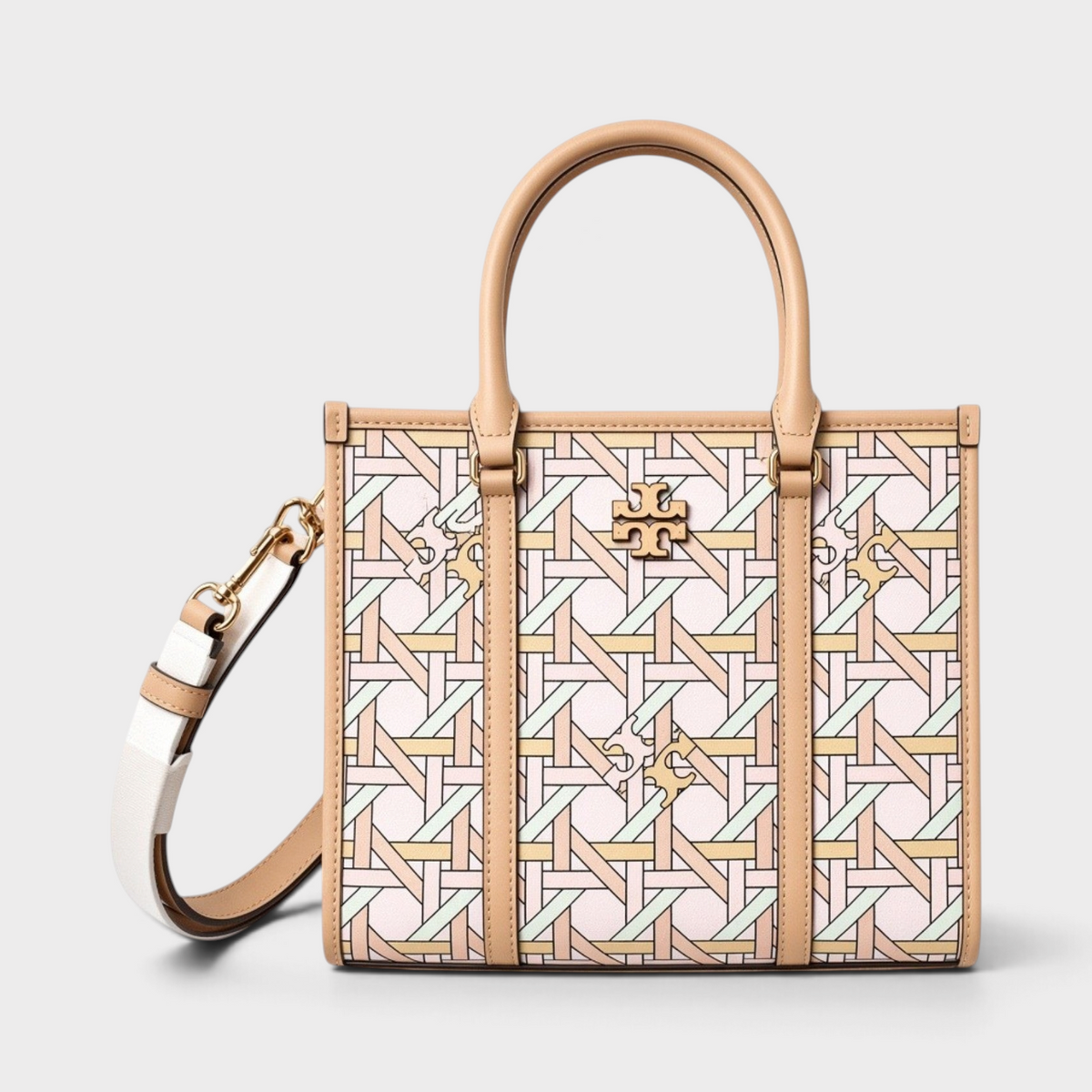 Supplied Fashion Blake small tote bag in pink basketweave fabric with tan leather trim and gold logo hardware.