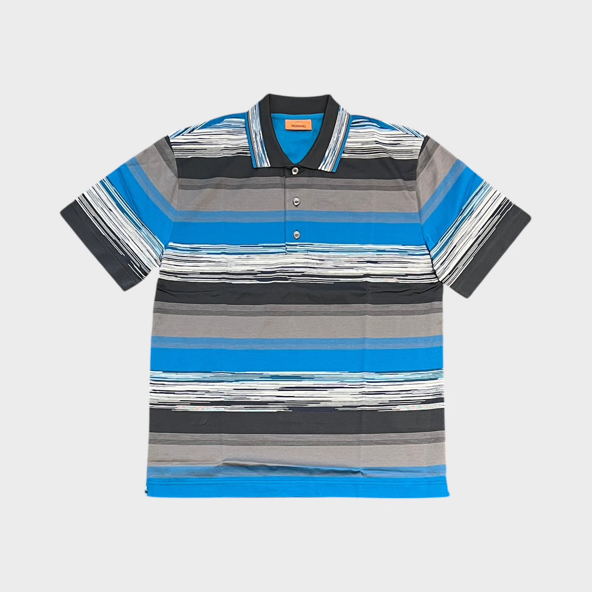 Supplied Fashion Missoni short sleeve polo shirt featuring a horizontal striped pattern in blue, grey, and white tones.
