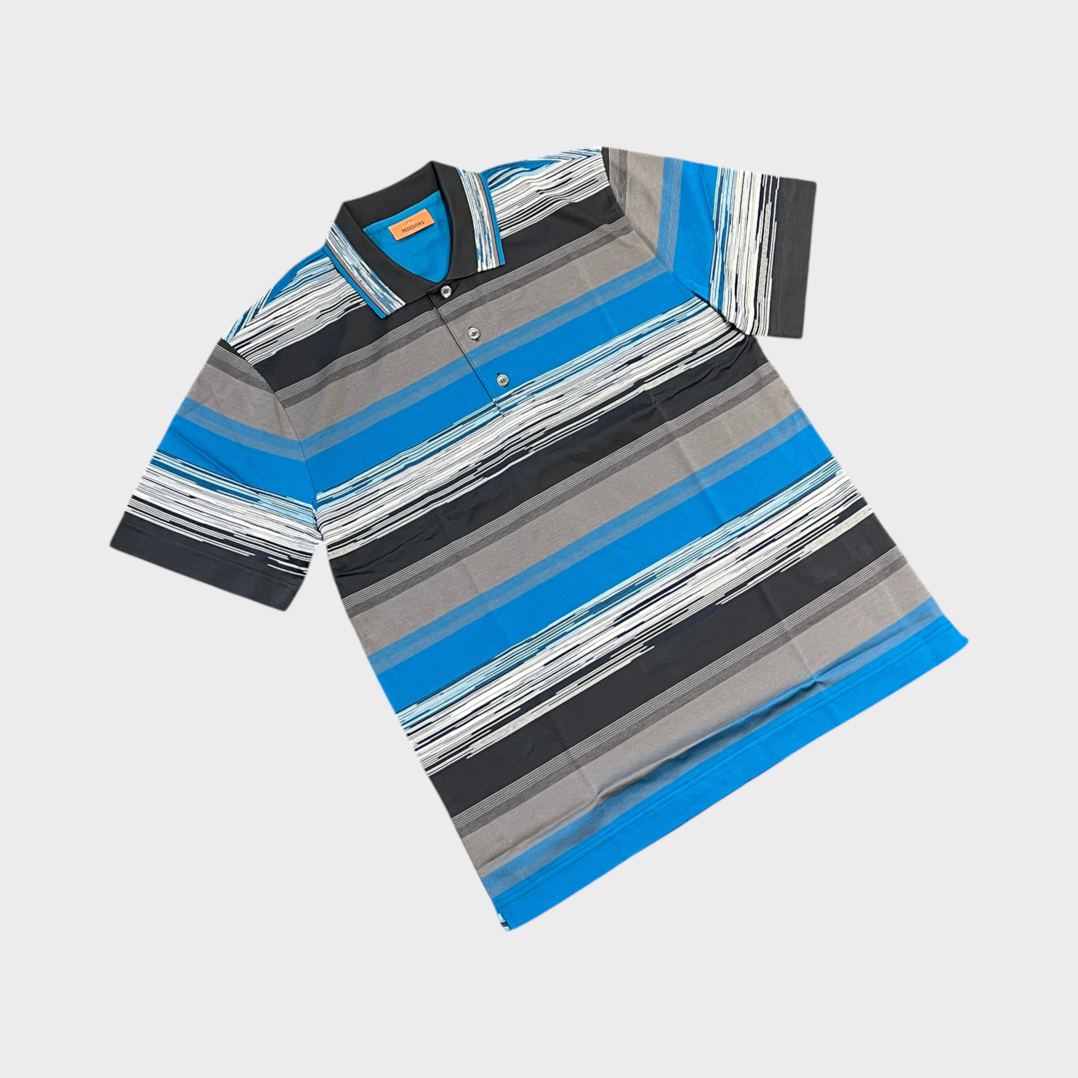 Supplied Fashion Missoni short sleeve polo shirt featuring a multi-tonal blue, grey, and white horizontal stripe knit.