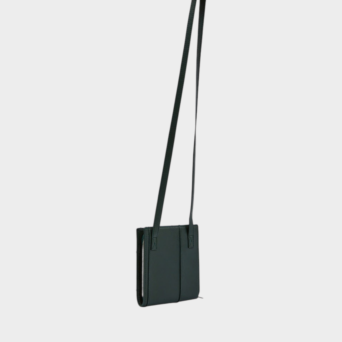 Supplied Fashion Le Gadjo dark green cross-body clutch with a slim profile and adjustable shoulder strap