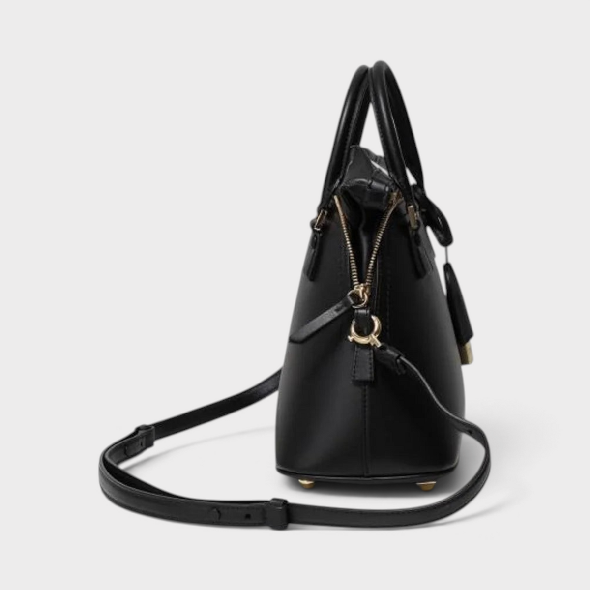 Supplied Fashion black 5AC mini tote bag shown from the side with a detachable shoulder strap and gold hardware.