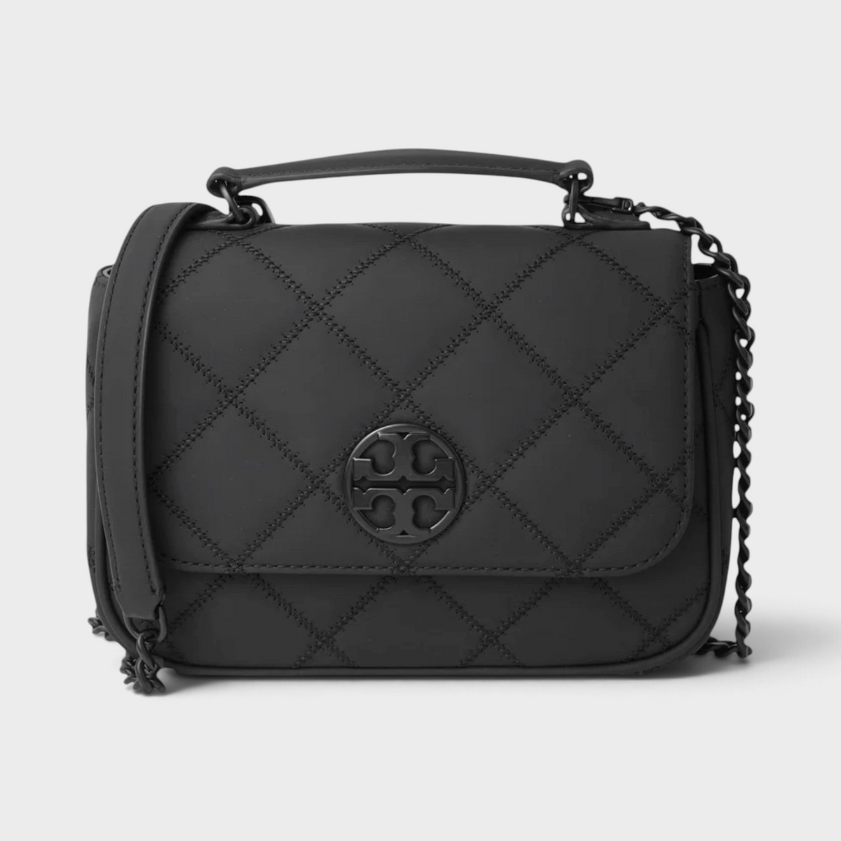 Supplied Fashion Willa matte black mini top handle bag with quilted diamond pattern and circular logo hardware