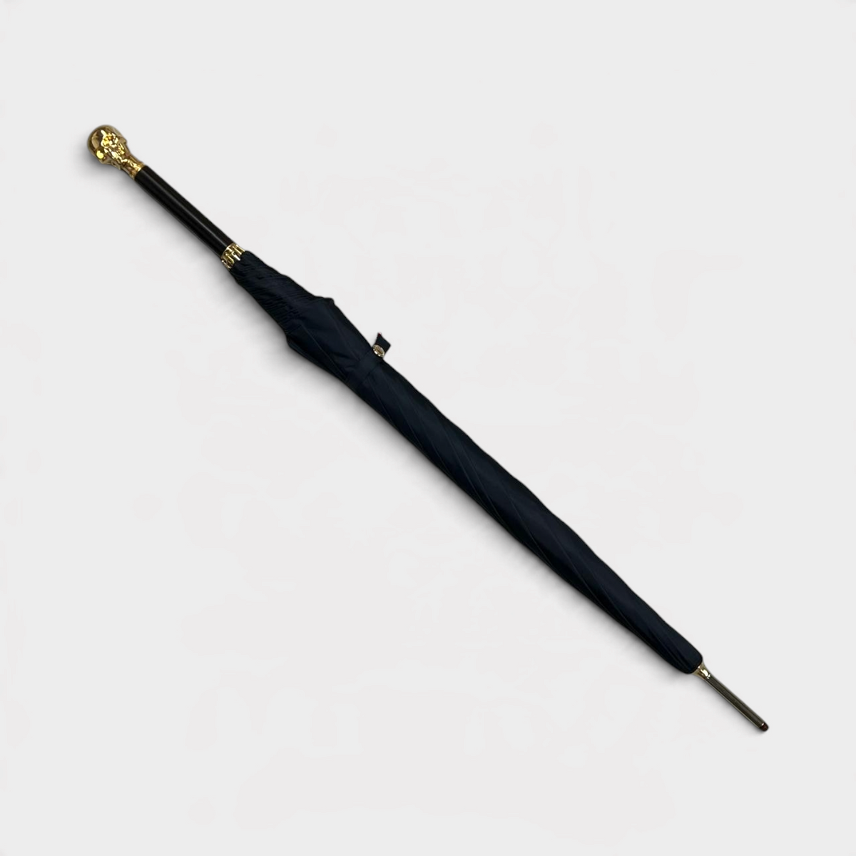 Supplied Fashion Alexander McQueen black umbrella with a gold skull handle and wood detailing