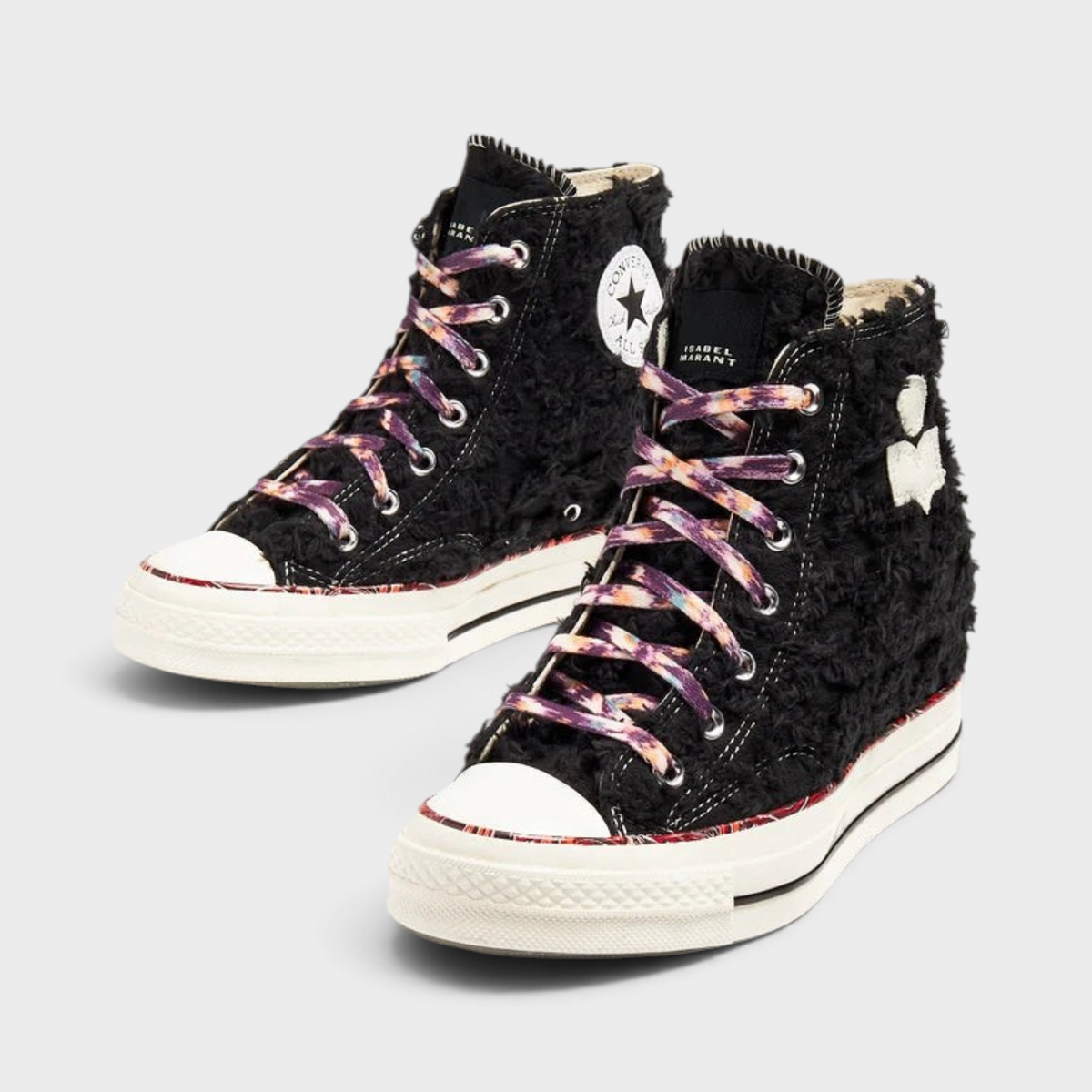 Supplied Fashion Isabel Marant Chuck 70 wedge sneakers in black textured canvas with multicoloured patterned laces.