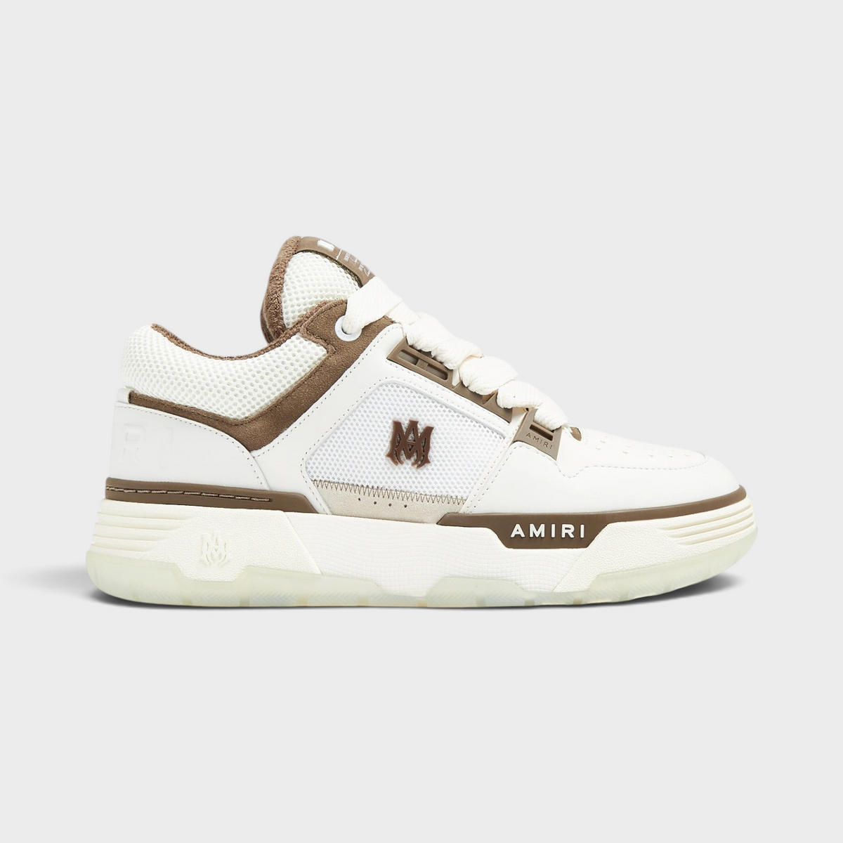Supplied Fashion AMIRI MA-1 low-top sneakers in white and brown leather with signature branding and mesh detailing