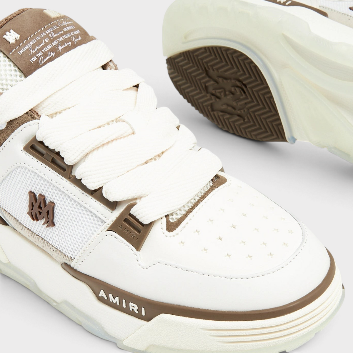 Supplied Fashion AMIRI MA-1 sneakers in white and brown leather with mesh panels and thick laces