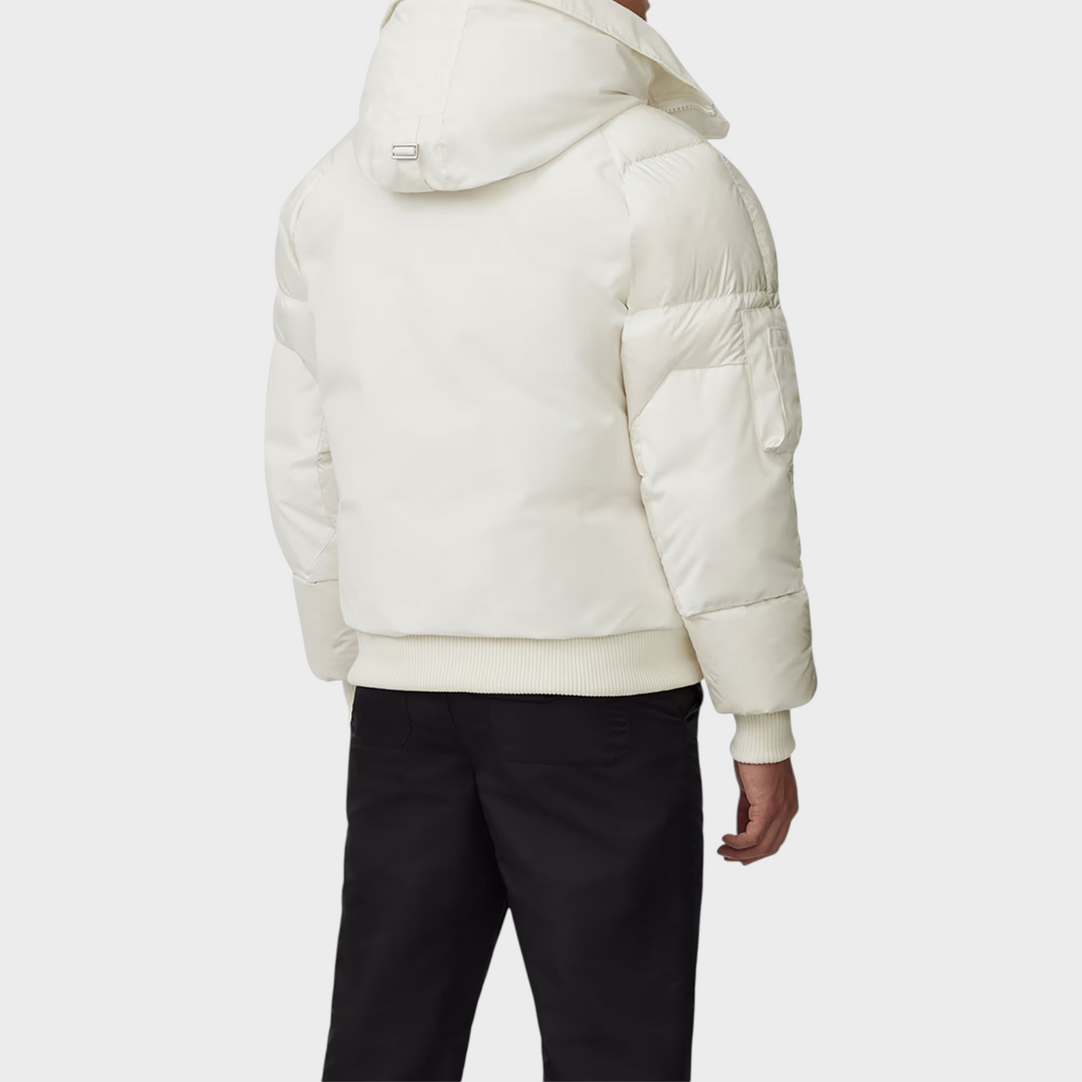 Supplied Fashion Paradigm Chilliwack white down bomber jacket with a hood, viewed from the back on a model.
