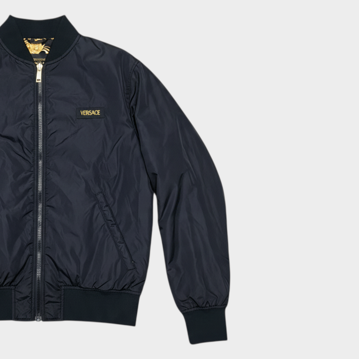 Supplied Fashion reversible black bomber jacket with gold Versace logo and Baroque print interior lining