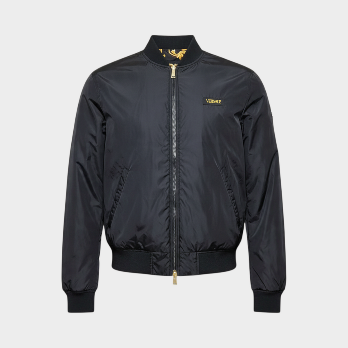Supplied Fashion reversible bomber jacket in black and gold with a bold Baroque print for men.