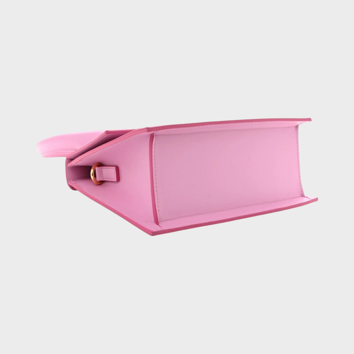 Supplied Fashion Le Grand Chiquito light pink leather handbag, side view showing structured base and gold hardware.