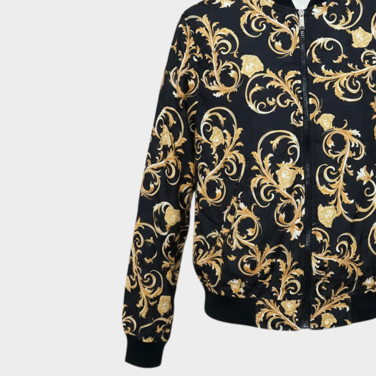 Supplied Fashion reversible bomber jacket in black and gold with an intricate Baroque print and zip-up front.