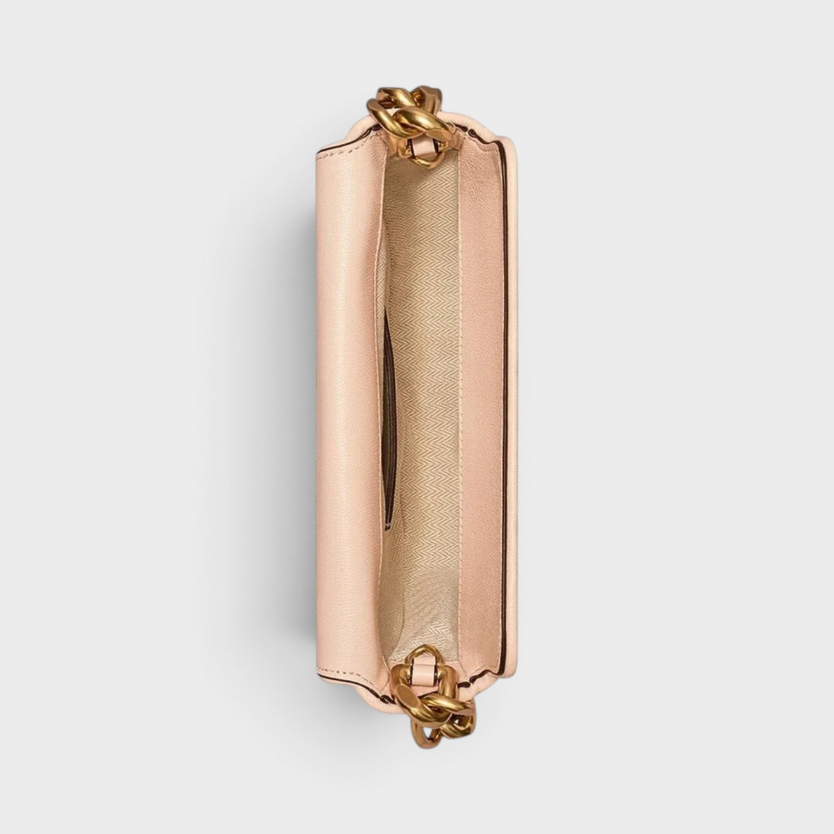 Supplied Fashion Tory Burch Fleming soft grain leather mini crescent bag in blush pink, top view showing interior.