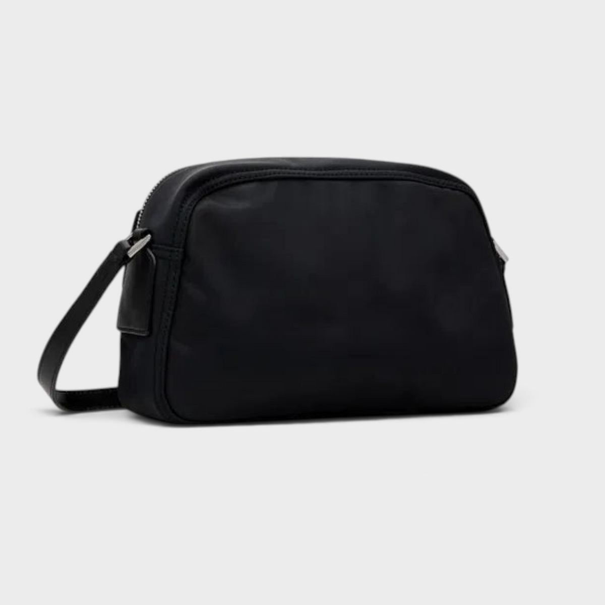 Supplied Fashion Ganni Bucky camera bag in black leather with a minimalist structured silhouette and shoulder strap.