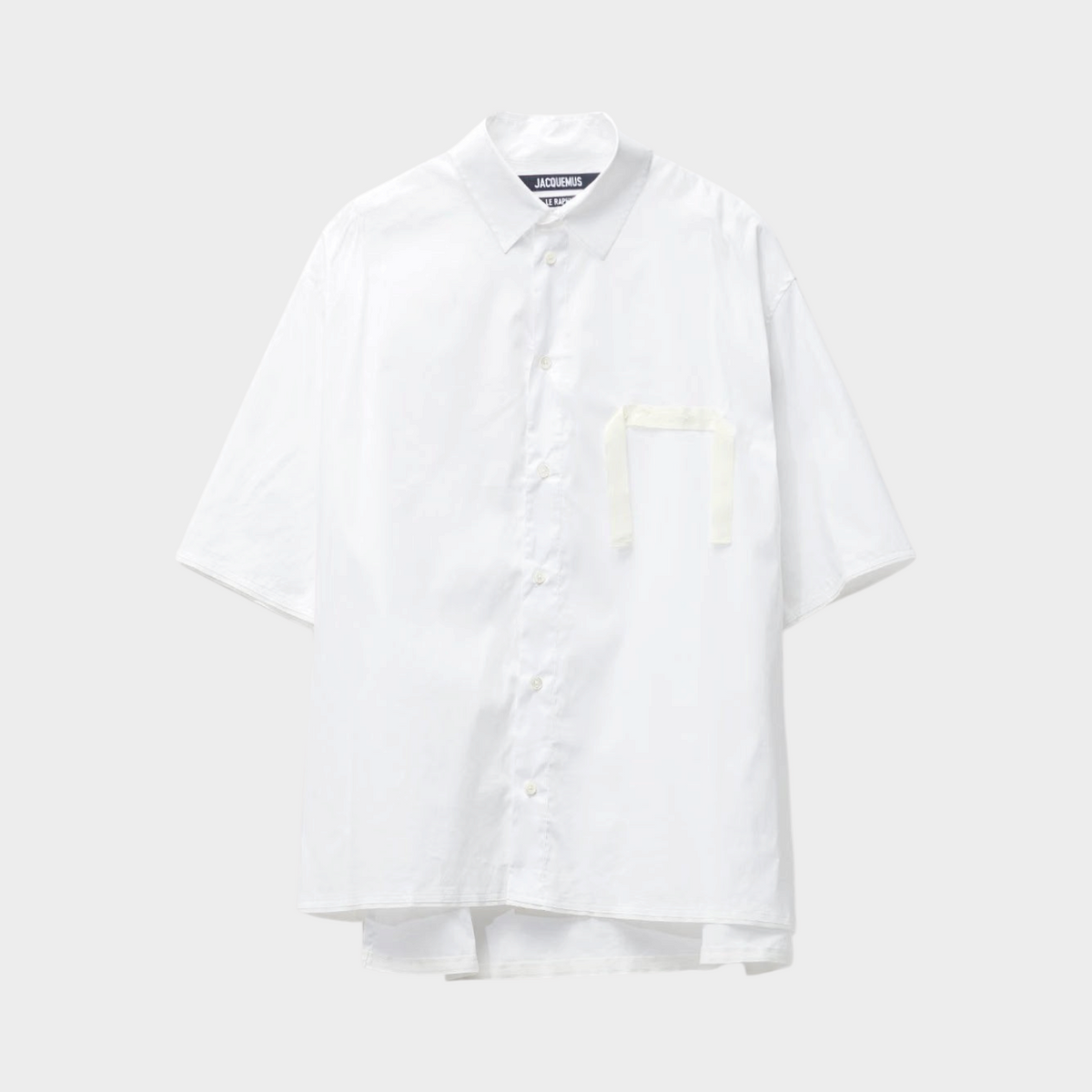 Supplied Fashion Jacquemus La Chemise Cabri white short-sleeve button-down shirt with a chest pocket detail.