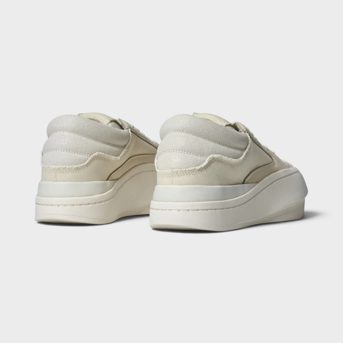 Supplied Fashion Adidas x Y-3 Centennial Low trainers in off-white leather with a chunky midsole and back view