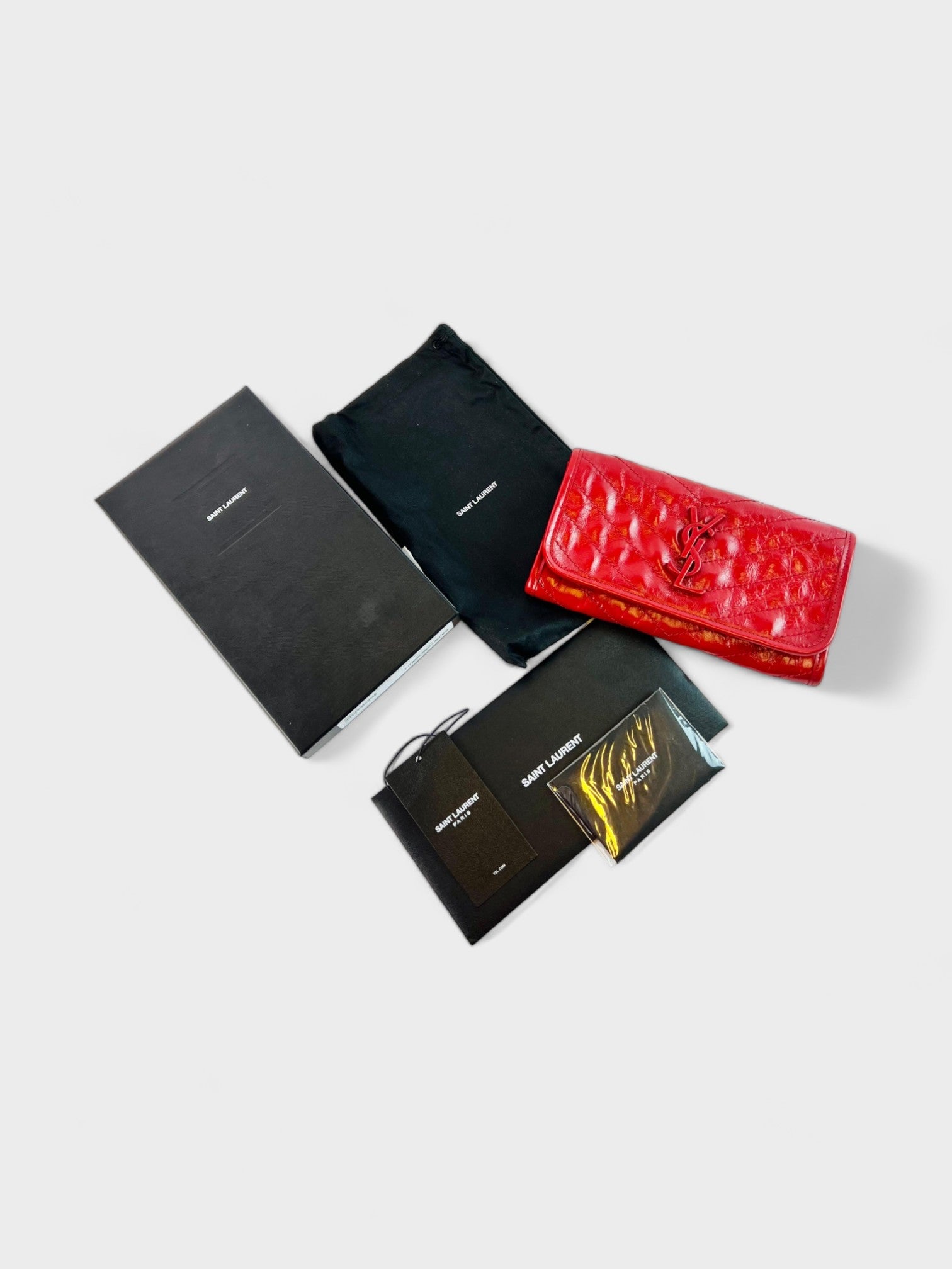 Saint Laurent Red Crinkled Calfskin Matelasse Niki Long Wallet - Supplied LuxurySaint Laurent