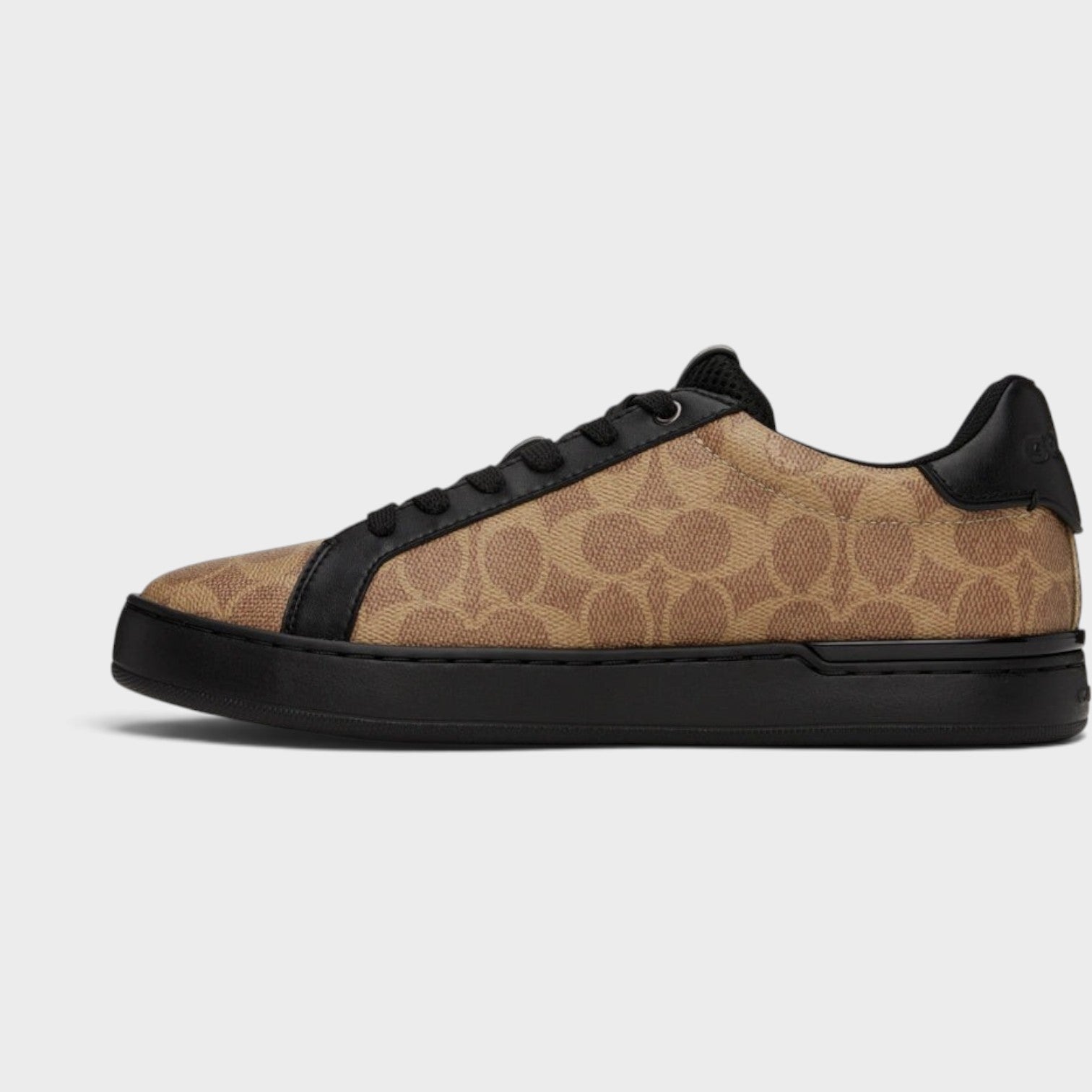 Supplied Fashion 1941 Lowline low-top sneakers in brown signature monogram canvas with black leather trim and soles.