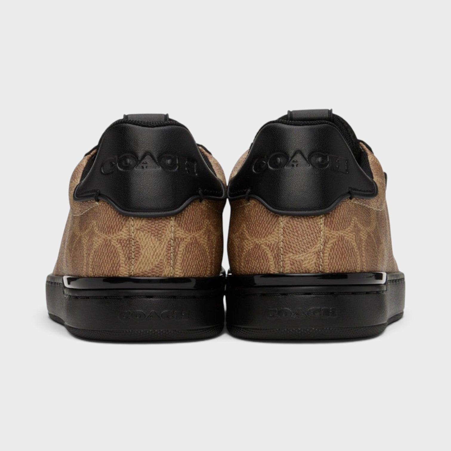 Supplied Fashion 1941 Lowline low top sneakers in brown and black monogram print with black leather heel tabs