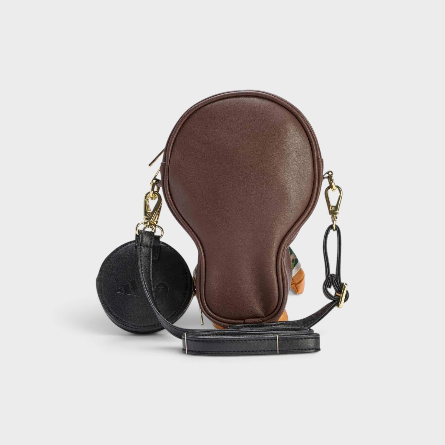 Supplied Fashion adidas x BAPE Baby Milo bag in auburn brown with a detachable black circular pouch and strap