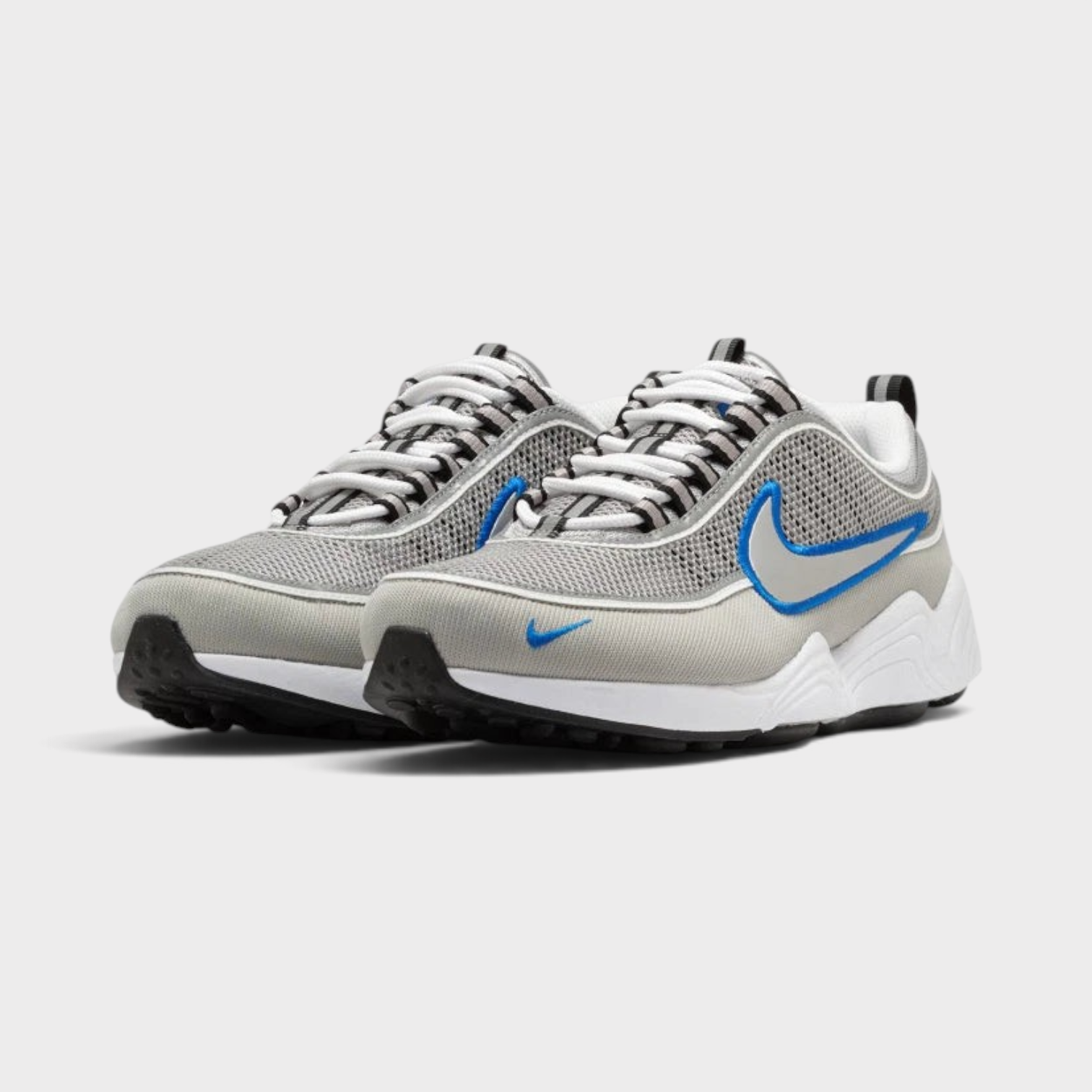 Supplied Fashion Air Zoom Spiridon SP sneakers in metallic silver and grey mesh with blue swoosh accents