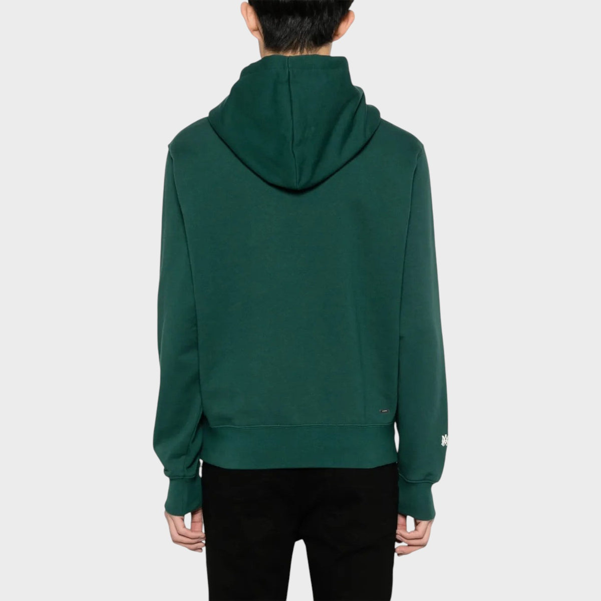 Supplied Fashion Amiri cotton-blend hoodie in rain forest green with a relaxed fit, viewed from the back.