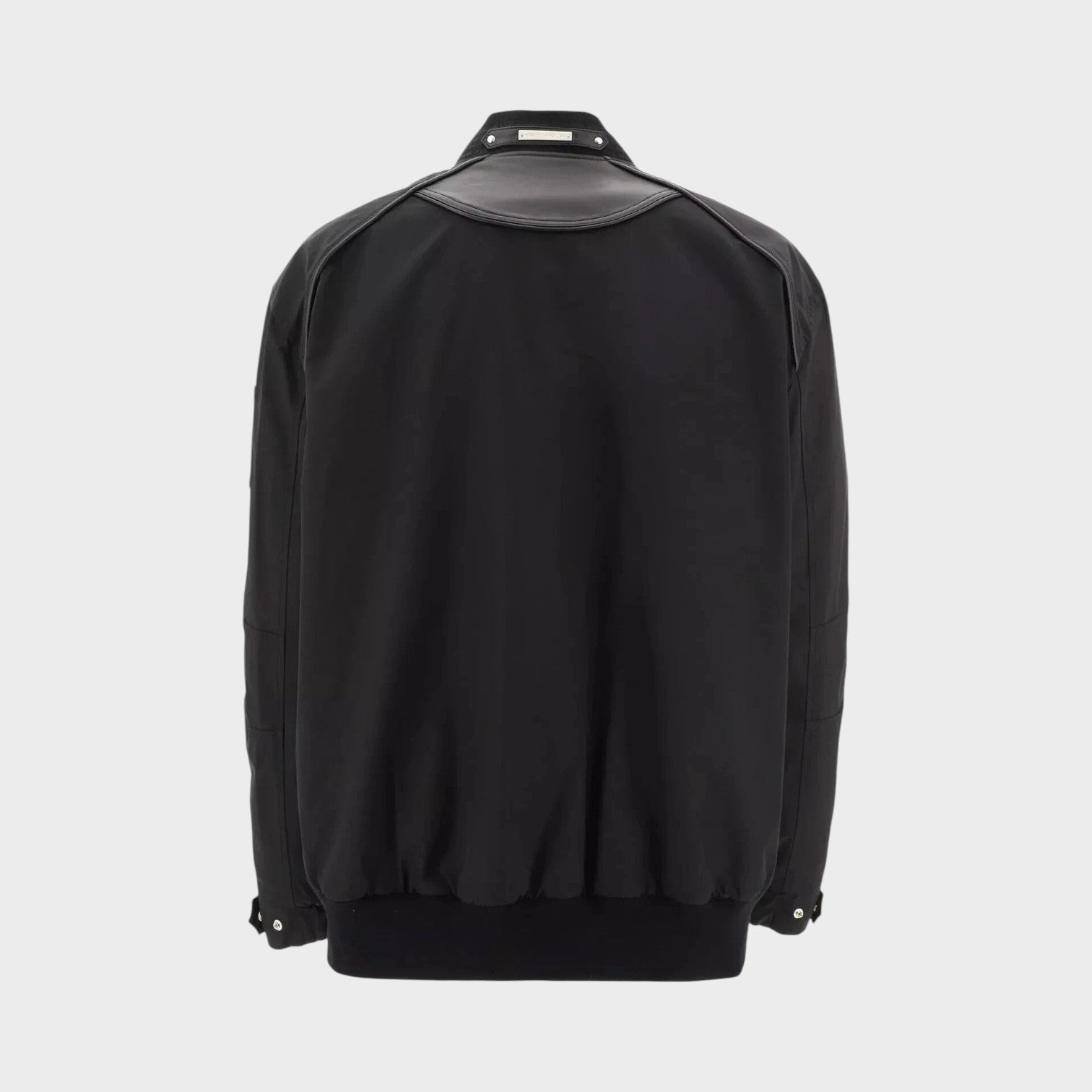 Back view of a black Anica bomber jacket by Supplied Fashion, featuring premium leather and a structured silhouette.
