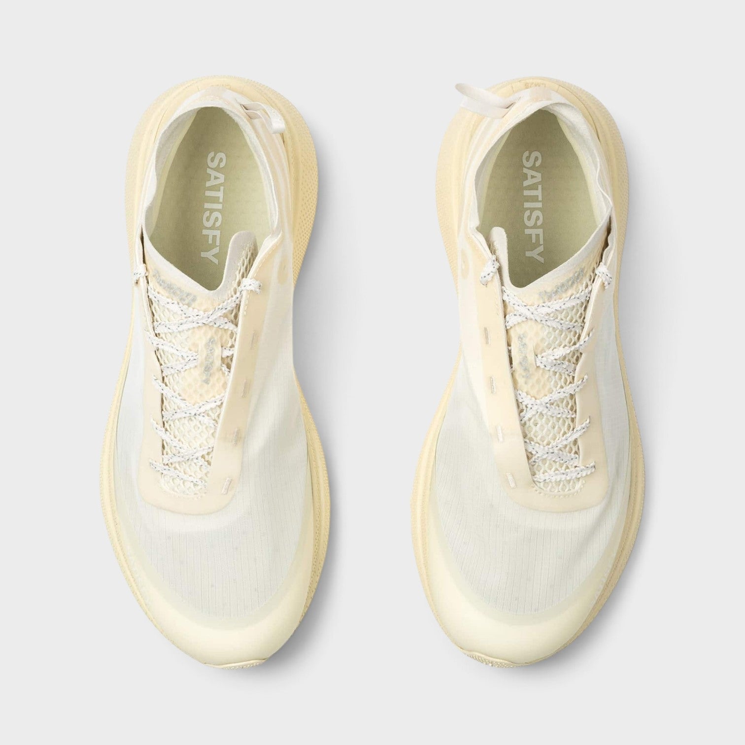 Supplied Fashion U The Rocker sneakers in antique white with a lightweight mesh upper and lace-up design