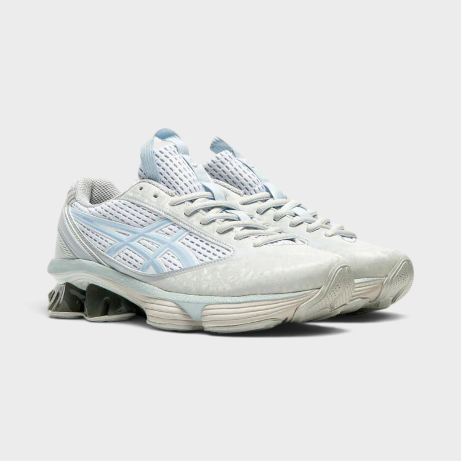 Supplied Fashion ASICS Gel-Kinetic Fluent women's running shoe in glacier grey and sky blue with breathable mesh upper.