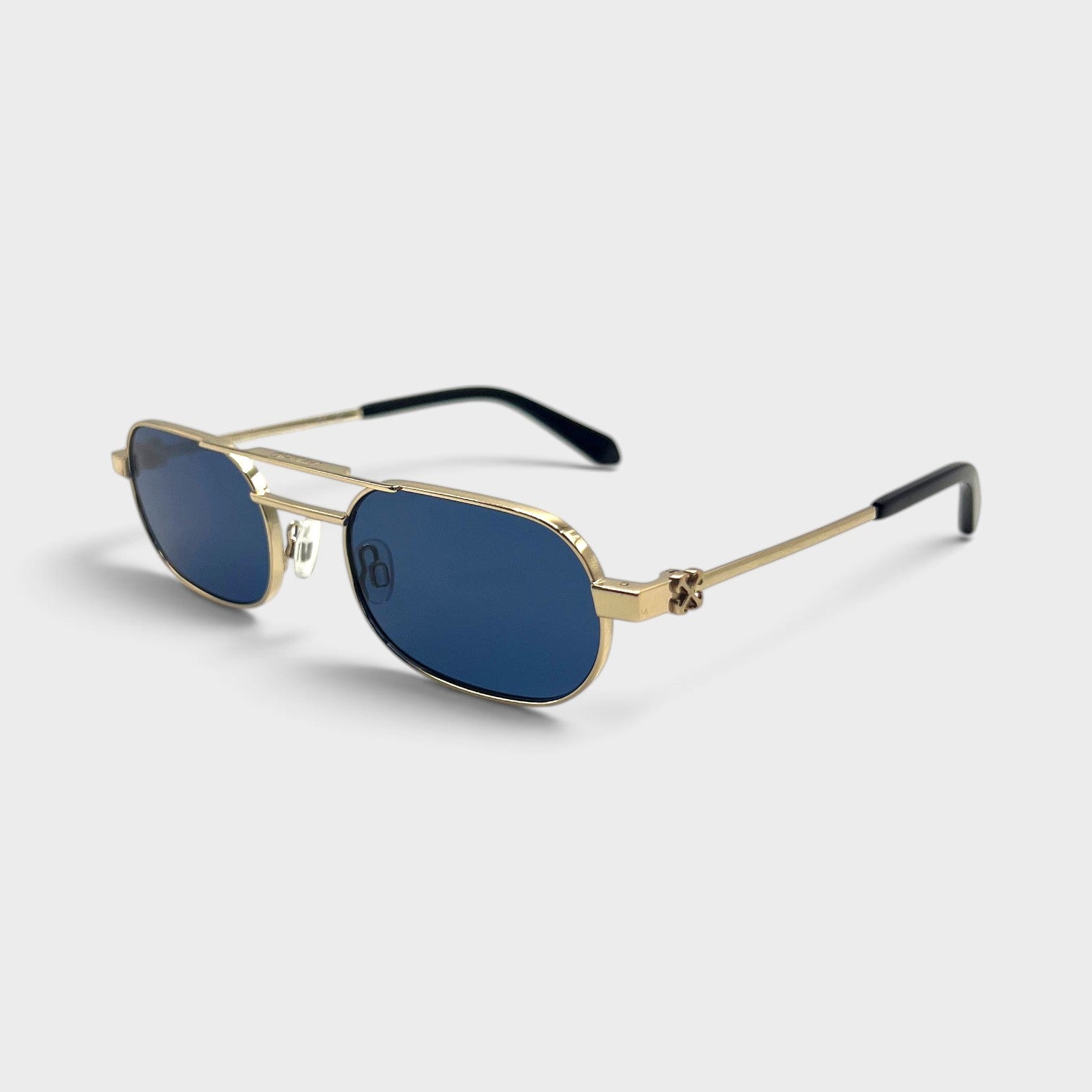 Supplied Fashion Baltimore Arrow sunglasses featuring a silver frame, blue lenses, and a classic double-bridge design.