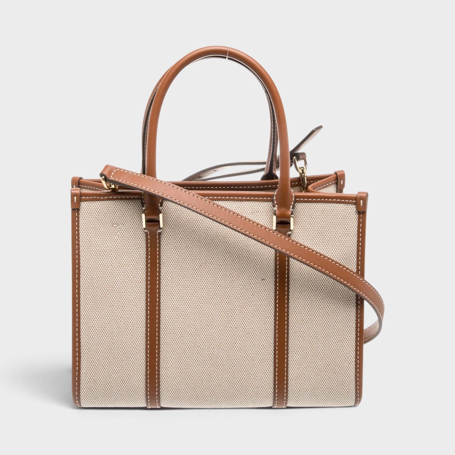 Supplied Fashion beige canvas top-handle bag with brown leather trim and a detachable shoulder strap