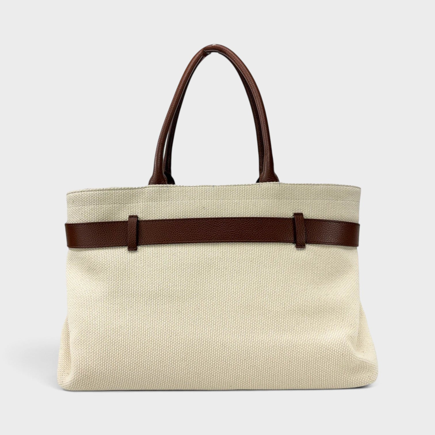 Supplied Fashion beige canvas tote bag with brown leather belt detail and matching brown leather handles.