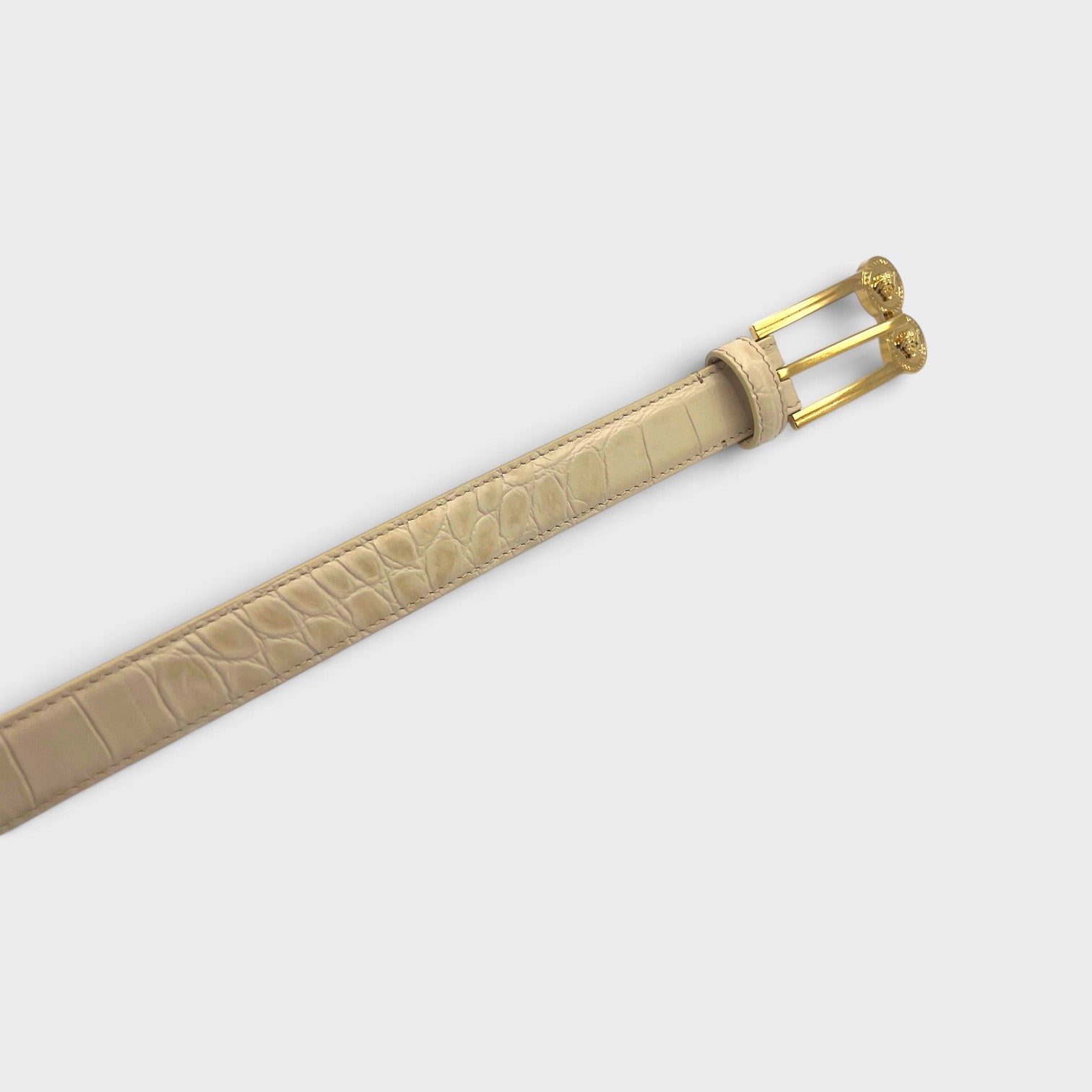Supplied Fashion beige embossed crocodile leather belt with a gold-tone double Medusa buckle.