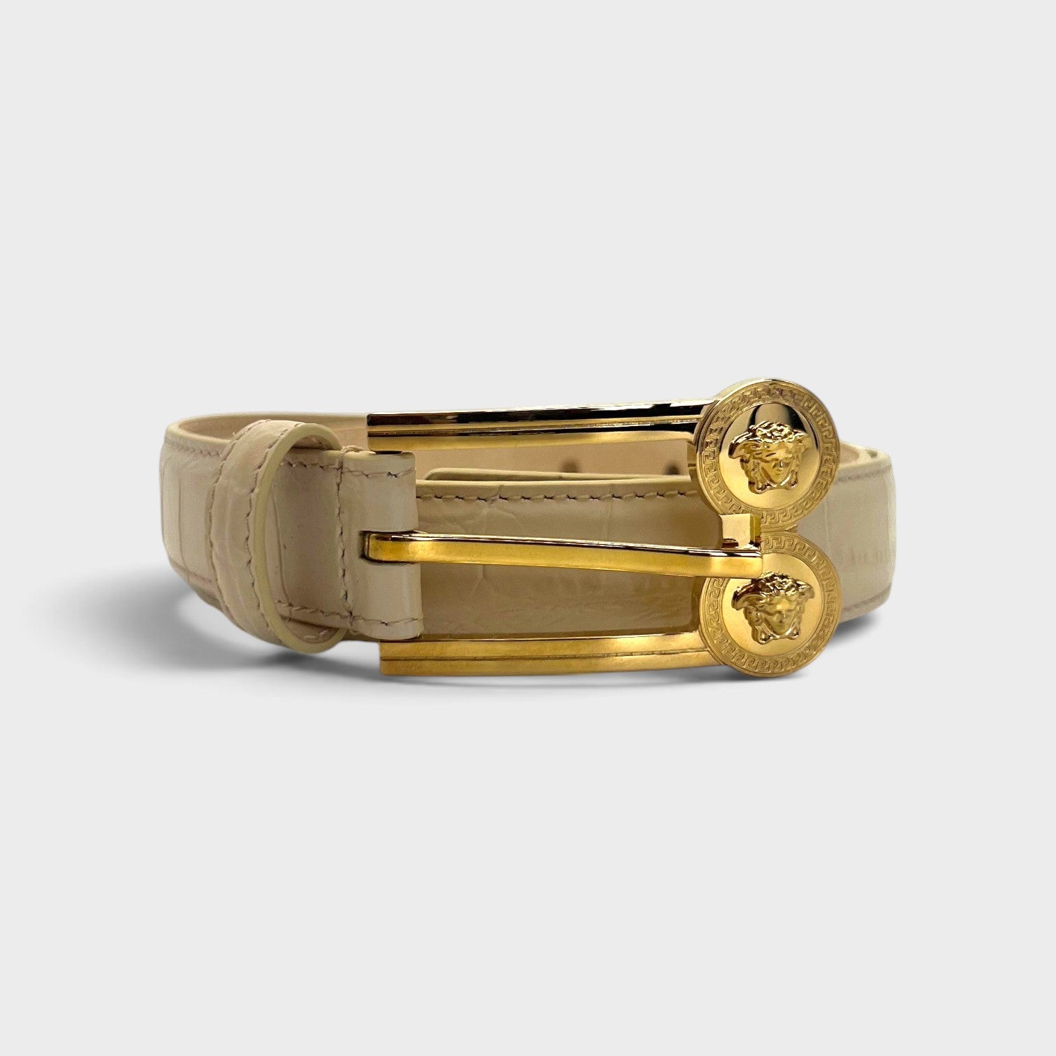Supplied Fashion beige embossed crocodile leather belt with a gold-tone double Medusa head buckle.