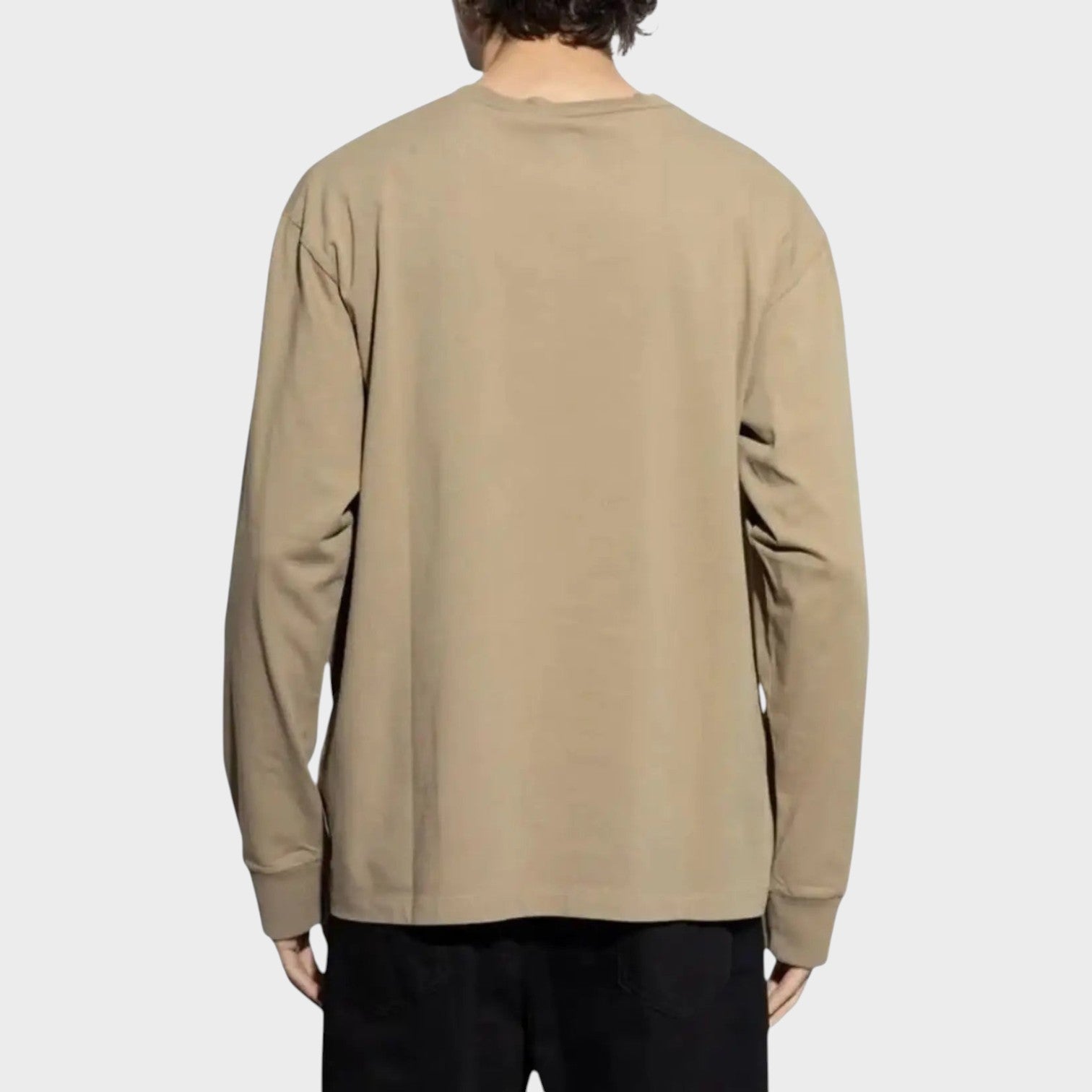 Back view of a Supplied Fashion Dsquared2 beige long sleeve loose fit cotton tee on a model